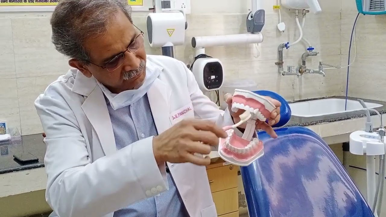 Dr. Ramesh Panchal providing dental treatment